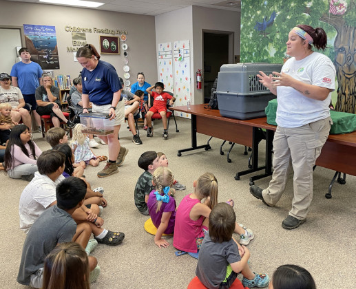 RAPT AUDIENCE Area children got a front row seat to the Abilene Zoo's presentation at the Spur library earlier this week. | TEXAS SPUR