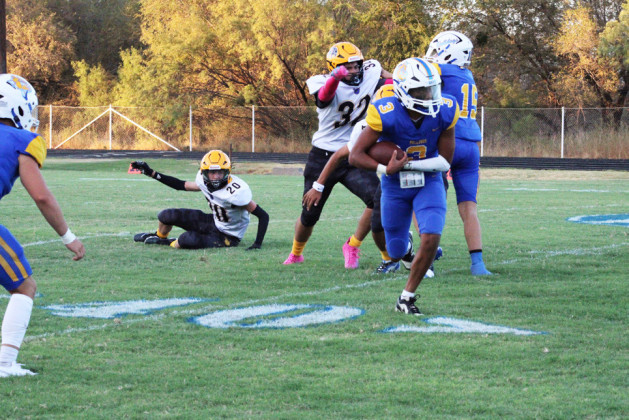 DOGSDIGWELLMANINTOHOLE with a 50-0 victory in the fourth quarter during Spur’s opening game of the 2024-25 season, at home in Jones Stadium. | COURTESY PHOTOS