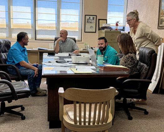 KENT COUNTY COMMISSION AND STAFF held a budget workshop last week to review projected income and expenditures for 2024–25. From left, commissioner Roy Chisum, county judge Layne Coulter, commissioner Ray Hall, treasurer Christy Long and human resources manager Gina Coulter (standing). Also participating in the workshop was county commissioner Robert Graham; commissioner Daryl Ham was absent. | THE TEXAS SPUR