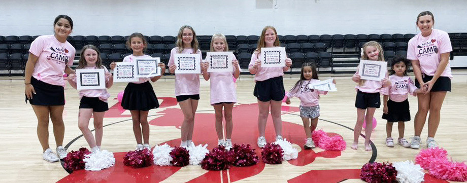 Patton Springs hosted a mini-cheer camp last week for their youngsters. High school volunteers Grace Barron and Tatom Bridge helped with training and leadership during the performance. | COURTESY PHOTOS