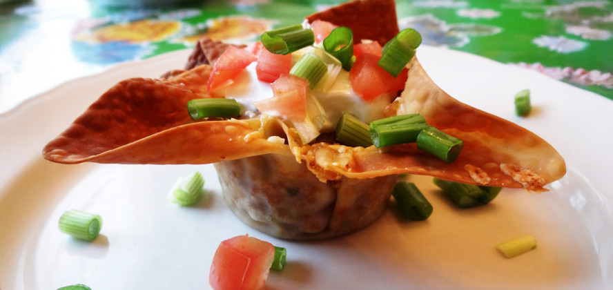 PARTY PREP Taco cups in muffin tins can be created by brushing egg-roll or wonton wrappers with oil to crisp in the oven, eliminating the need to for deep frying. | ANGELINA LaRUE PHOTO