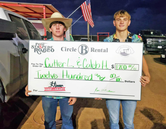WIN AGAIN For the second year in a row, Cutter Lee and Caleb Herzog of Kent County participated in the calf scramble at the Post Rodeo—and came out on top. Their efforts won the JGISD FFA chapter $1,200. | COURTESY PHOTO