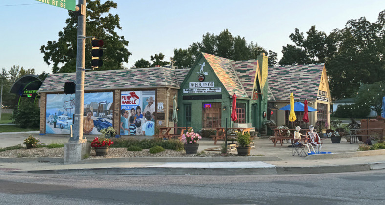 WEIR OPEN In 1932, Paul T. Carr built the old Phillips 66 station in Cuba, Missouri, which also sold used cars; later it became theWallis Oil Company, and in the 20th century it was restored as a café.