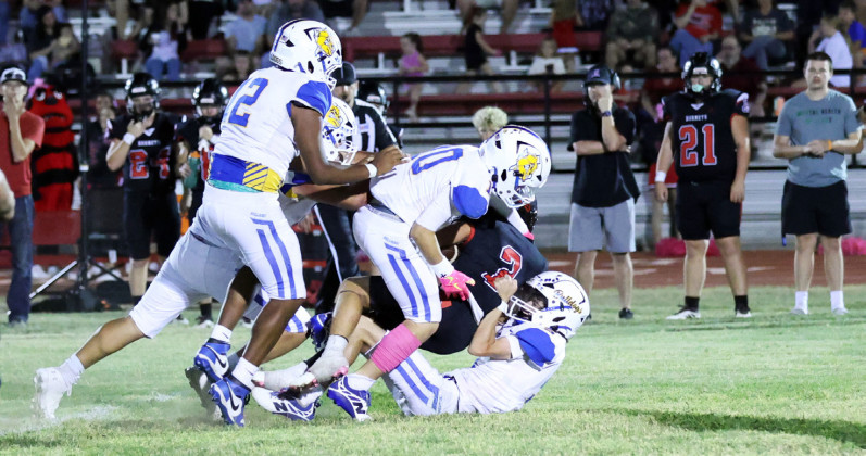 DEFENSE PRESSURE Spur's defense played an aggressive game in the physical 61-16 loss to the Aspermont Hornets Friday night. | COURTESY PHOTO
