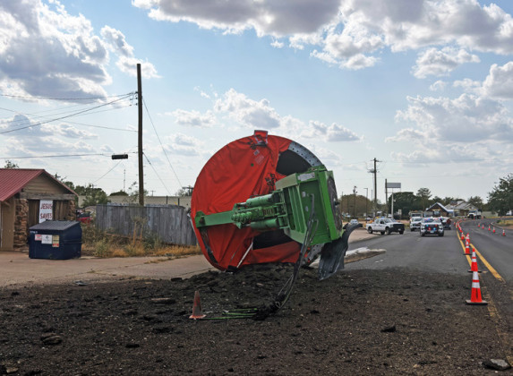 OVERSIZED LOAD OVERTURNS IN SPUR
