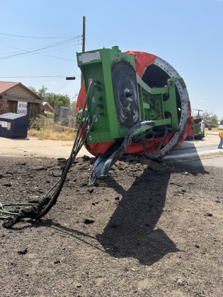 OVERSIZED LOAD OVERTURNS IN SPUR