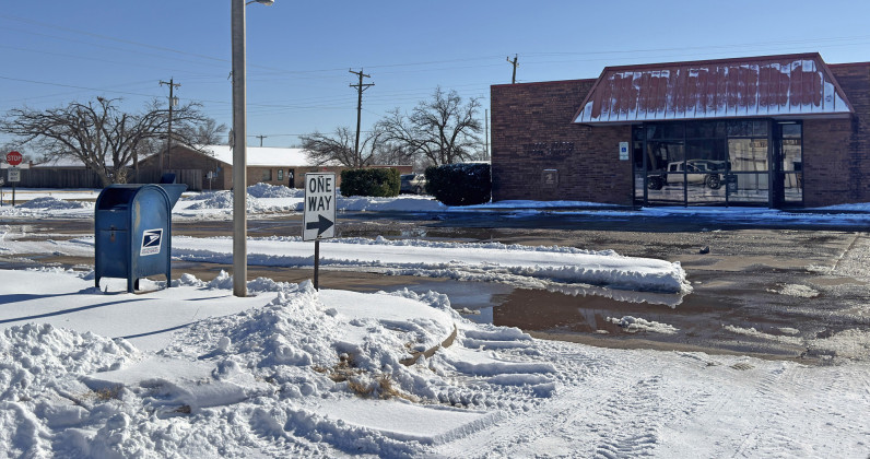 NEITHER SNOW NOR …ICY ROADS? The Spur post office managed to make its parking lot safe for patrons after Winter Storm Fern by Monday morning, Jan. 26, thanks to the efforts of Wes Joplin’s Millitary Mowing, according to postmaster Jason Tanner. The lot was bladed clean with snow piled four feet high on the western edge, and sidewalks were treated with de-icing salt. | TEXAS SPUR