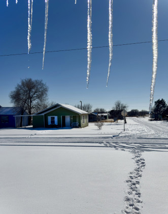 ICICLE SPEARS may have barred the way for exiting many front doors throughoutTexas Spur Country until late Monday afternoon, after snow accumulations on sun-heated roofs had thawed somewhat Sunday and refrozen overnight. | COURTESY PHOTOS