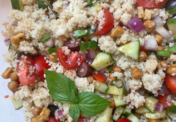 COOKED GRAINS with roasted chickpeas and tofu, mixed with fresh herbs, tomatoes, cucumbers, red onion, and tangy olives combine to give us the tastiest serving of veggies and protein I’ve had all season. | ANGELINA LaRUE PHOTO