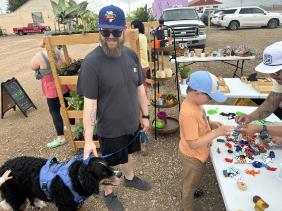 POODLE AND POOCH An Amarillo Sod Poodles baseball fan brought his four-legged friend along to the Helium Heights Market June 6. | TEXAS SPUR