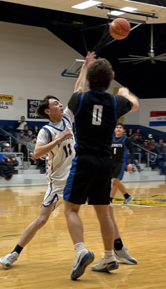 Spur’s Slydder Bateman defends against Valley.