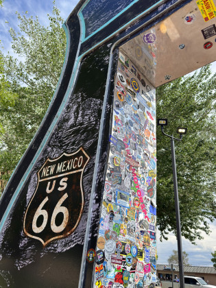 STOP THE STICKERING! At the Route 66 drive-through photo op in Grants, New Mexico (where your authors snapped this image July 7), layers of adhesive stickers threaten to overwhelm the structure’s sleek surfaces.