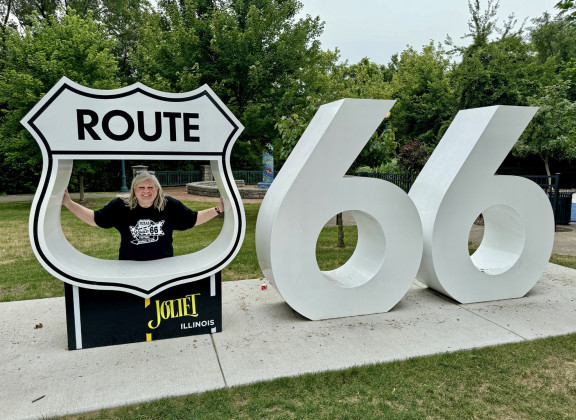 WISHYOUWERE HERE Postcard and photo props—like this one in Joliet, Illinois—abound all along the 2,448 miles of historic Route 66 from Chicago to Los Angeles. | TEXAS SPUR.