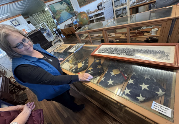 SOMEGAVEALL On Saturday afternoon’s tour, Dickens Museum curator Ruby Combs pointed out numerous exhibits that illustrate the valor and sacrifice by local members of the armed services, from a Civil War–era saber, to Armistice headlines in The Dickens Times and other local newspapers of 1918, to World War II uniforms and letters home. | THE TEXAS SPUR