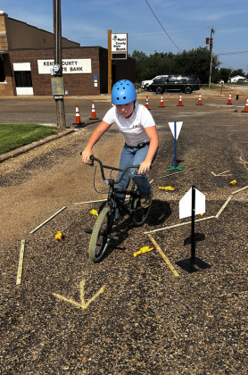 KENT LIBRARY BIKE RODEO At the Kent County Library last week, the Texas Department of Transportation and the Kent County Library teamed up to teach local youngsters bike safety as a part of the library’s summer reading program. Youngsters brought their own bikes, learned about bicycle safety and received a free helmet. | COURTESY PHOTOS
