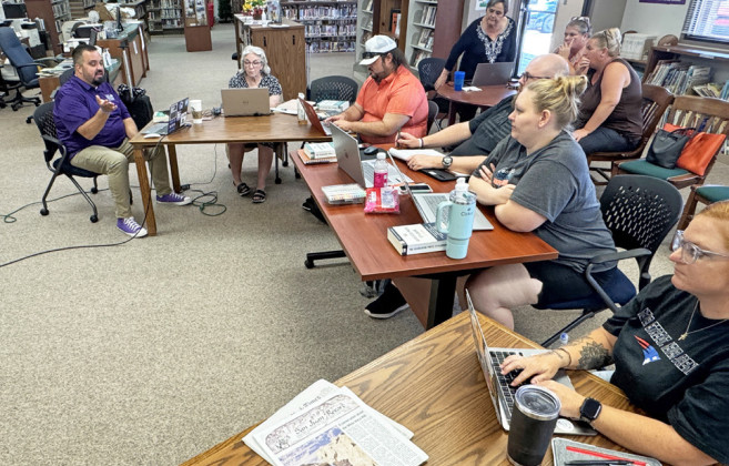 WORKINGJOURNALISTS Staff from five West Texas weekly newspapersmanagedbySpurbased Paragraph Ranch LLC Media participated in a daylong news writing workshop July 19 at the Dickens County Spur Public Library.The session was led by Texas Center for CommunityJournalismdirector Austin Lewter of Tarleton State University, which provides a wide array of resources for journalists at all stages in their careers. | TEXAS SPUR PHOTO