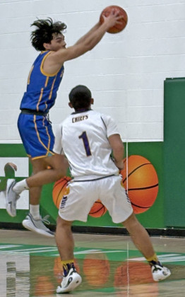REBOUND Spur BKB Bulldog senior Josh Ortiz grabs a defensive rebound in first-quarter action of Spurs’ playoff game with Crosbyton. The Bulldogs fell to the Chieftains the third time this season, 61-49.