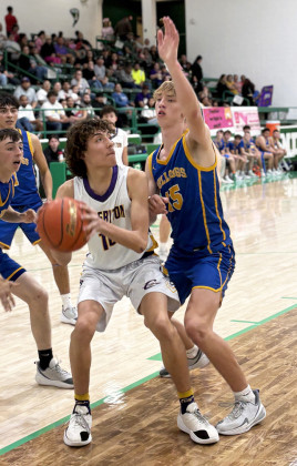EXCHANGE STUDENT Matthijs De Boer (15) defends in the paint in the Bulldogs’ bi-district game with Crosbyton Feb. 24.