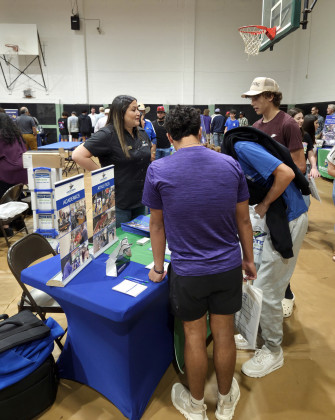 WTC COLLEGE FAIR COMING UP Isrell Lawson, WTC’s Welcome Center and Enrollment Outreach Director, speaks with prospective students at the 2025 Western Texas College Fair. | COURTESY PHOTO