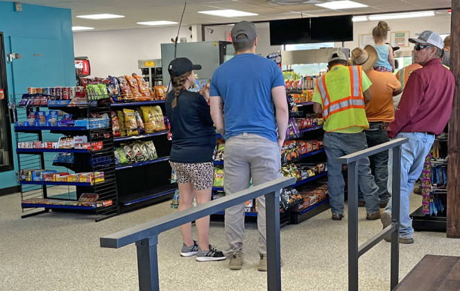 Lucee’s opens to crowds seeking fuel and fried chicken