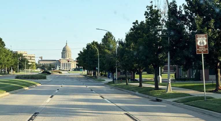 ALONG ROUTE 66 in OKLAHOMA sites include Big Bill statue, Vinita; Pryor Creek Bridge, Chelsea; Catoosa, Blue Whale; Commerce, water tower with Mickey Mantle pinstripes and number; Oklahoma City, capitol building; Erick, Roger Miller mural; Tulsa, Black musicians mural.