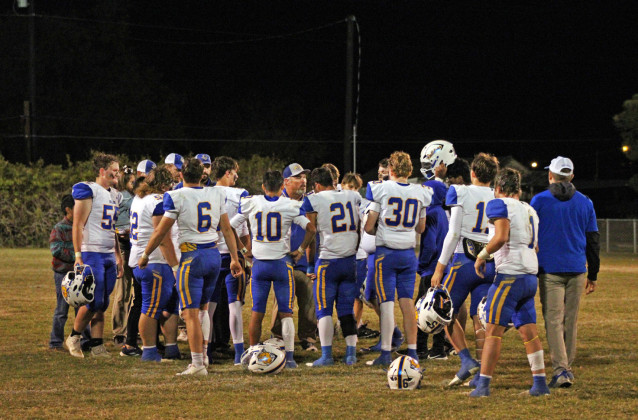 LIGHTS OUT ON A STELLAR SEASON The Spur Bulldogs, under a staff headed by interim coach Craig Hamilton (center) lost by the mercy rule in last week’s post-season contest against Newcastle. | SPUR YEARBOOK PHOTO