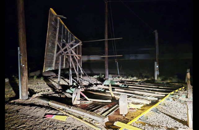 THEREITWAS On July 21, a desert storm through the Joseph City area destroyed the original sign; Cindy and Tony posted this image on their Facebook page during the night. | COURTESY PHOTO