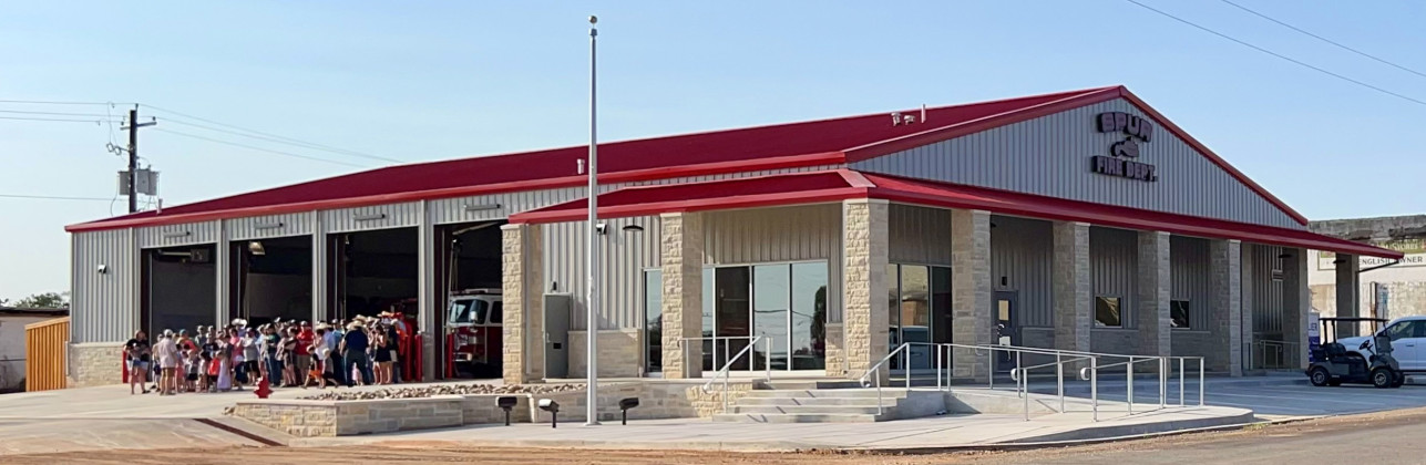 FIREFIGHTERS AND FAMILIES celebrated the Spur Volunteer Fire Department’s move-in day at the new fire station July 15. | SPUR VFD PHOTO