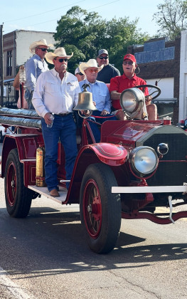 FIRE CHIEFS process proudly from Spur’s old firehouse to the brand-new one July 15. | THE TEXAS SPUR
