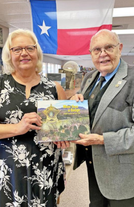 Former sheriff Williams donates volume to Spur library
