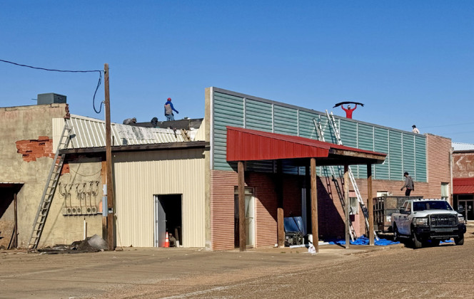 SUMMER SPIFF-UPS Throughout the warm months in downtown Spur, projects proceeded, with landscaping and a new mural in Rickels Park, a new roof for the Back Door Inn annex, and demolition of the oldWyattTractor building next door to the new Spur fire station. | TEXAS SPUR PHOTO