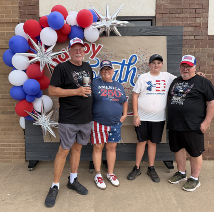 BLUE RIBBON Jay and Jodie Boland earned first place in the golf cart division of the “Cruisin’ for the Red, White and Blue” parade July 4 in Jayton. | STEPHANIE ALLEN