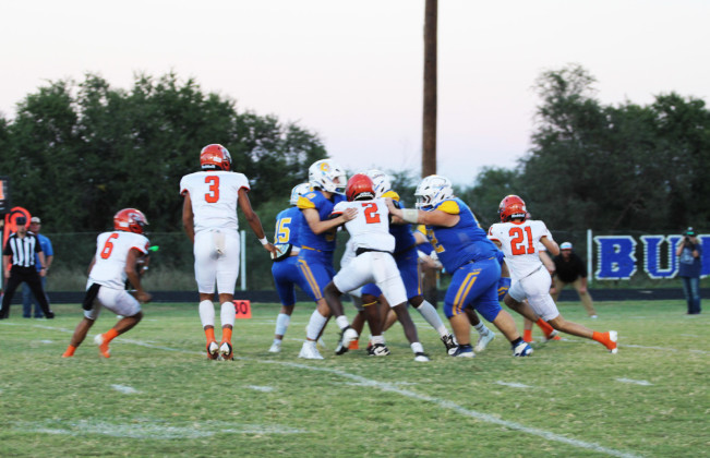 DEFENSE AGAINST DRAGONS wasn’t quite enough to prevent a Bulldog loss at home Friday night. | SPUR YEARBOOK PHOTOS
