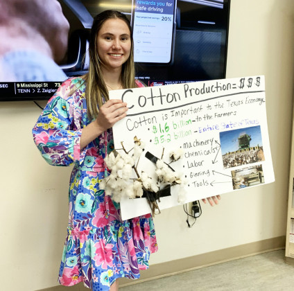COTTON PRODUCTION was one focus of Jeri Holcomb's 4-H training — and the flowered, ruffled dress is one she made herself. | COURTESY PHOTO