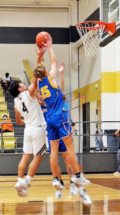 REBOUND Mattijs De Boer grabs a rebound in the Bulldogs’ season opener against Haskell
