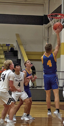 IN THE PAINT Wade McGalliard scores inside the paint for the Bulldogs against Haskell.