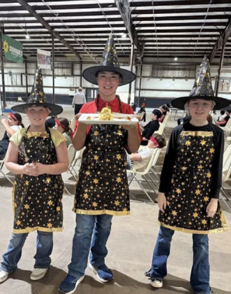 THE JUNIOR 2 TEAM, featuring Luciana Garcia-Reese, Bellamy Stringer, and Zayden Pierce, competed in the side dish category. While they did not place, their participation showcased their dedication and teamwork.