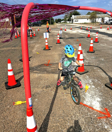 BIKE EXPO Sergeant Marc Couch from TxDOT conducted a bicycle safety course last week at the Kent County Library. The event included a helmet giveaway and included a hot dog lunch provided by the Snyder United Supermarket. | COURTESY PHOTOS