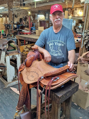 SADDLEMAKER Will Burgess has once again crafted a fine saddle that will go to theTop Hand to be announced Saturday night at the 102nd Motley-Dickens Old Settlers Reunion &amp;amp; Rodeo at Roaring Springs. | COURTESY PHOTO