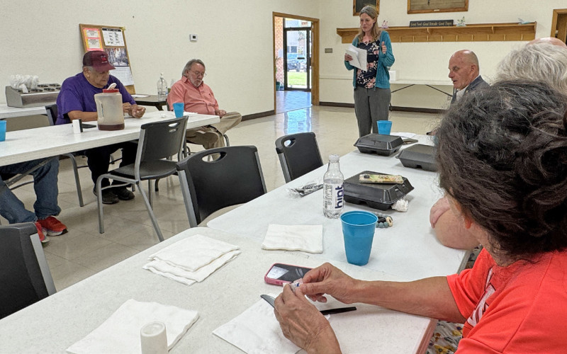 COMMUNITYSUPPORT from the Kent County Lions Club is aiding the public library’s summer reading program, as presented by librarian Joy Williams (right) and a community-wide beautification effort, as club president Stephanie Allen described in the May 11 commissioners court. | TEXAS SPUR