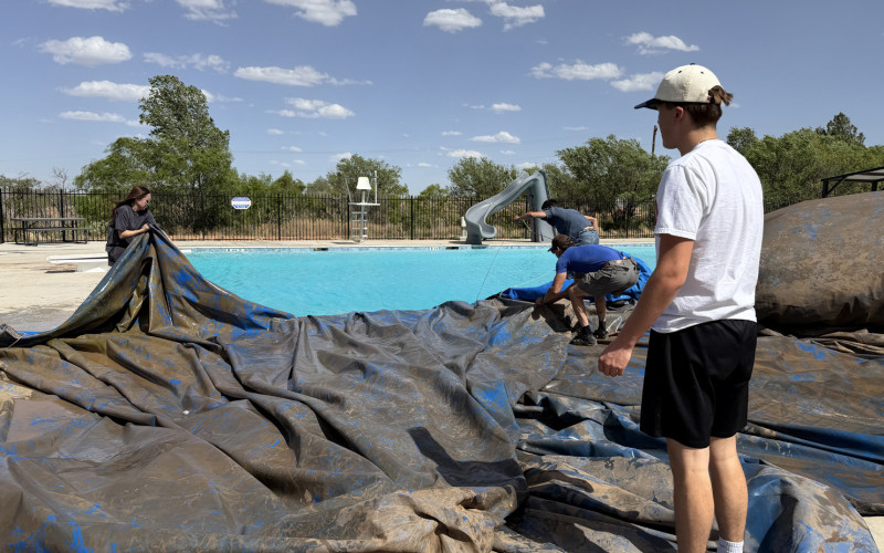 UNVEILING SUMMER Volunteers came together Sunday to pull the cover off the Spur Community Pool at Swenson Park. The pool manager has been hired, and lifeguards are being hired. The City has discussed having the pool ready to open toward the end of May. | TEXAS SPUR