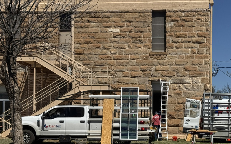 INSTALLATION OF NEW WINDOWS in a historically appropriate style has begun this week at the Dickens County Courthouse, after a lengthy period on order. In July 2025, county commissioners accepted a sole bid of $345,000 for replacement of 43 Peerless windows and $37,300 for three doors, which are approved by Texas Historical Commission standards for historic buildings.The repair was required to mitigate persistent leaks. | TEXAS SPUR