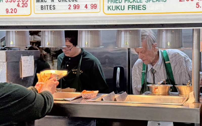 WOULD YOU LIKE SOME KUKU FRIES with that? Gene Waylan, above right, has owned and operated the last remaining restaurant in the former Ku-Ku chain for more than half a century.