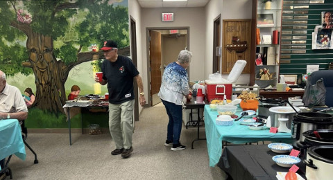 Chili sampling makes for a warm welcome to library dinner