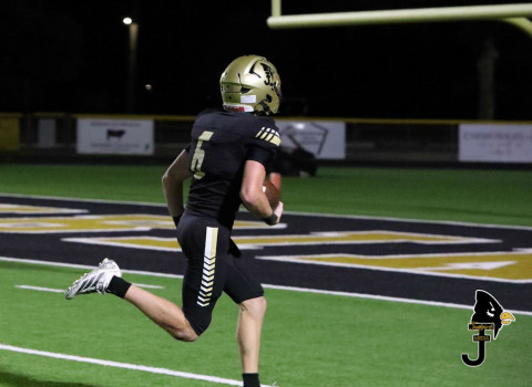 TOUCHDOWN Junior wide receiver Tucker Scott (6) heads to the end zone for a Jaybirds touchdown with his pass reception. | COURTESY PHOTO