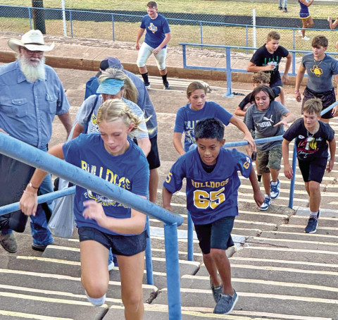 MEET THE BULLDOGS, SPURETTES Spur families, students and fans got their opportunity to Meet the Bulldogs and the Spurettes Friday night at Jones Stadium.The football team scrimmaged the Kress Kangaroos, new to the realigned district.The gridiron action was followed by an ice cream supper. See more photos on page 9. | TEXAS SPUR PHOTO