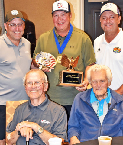 TOPUMP After being awarded the Chuck McAllister Umpire Award, Jayton resident Stephen Reynolds (standing, center) celebrated the recognition in a photo with Jeff and Sam Pizzo and Greg and Dan Bzura, the only two directors the Junior League World Series has ever had. | COURTESY PHOTO