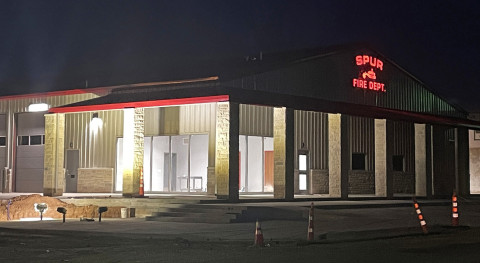 LIGHTING UPTHE FIREHOUSE Two weeks ago the illuminated sign was erected on the front of the new Spur fire station; soon afterward, outside lights were also turned on. | THE TEXAS SPUR