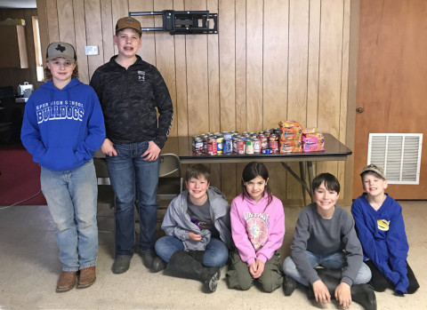 SOUPER BOWL Dickens County 4-H teamed up with Texas State 4-H and Tacklehunger.org to participate in the Souper Bowl of Caring. Six members collected more than 70 cans of soup to be delivered to the Spur Food Bank: from left, Tyler Phillips, Grayson James, Henry Chapman, Avery Lennon-Torres, Calvin Chapman and Finn James. | COURTESY PHOTO
