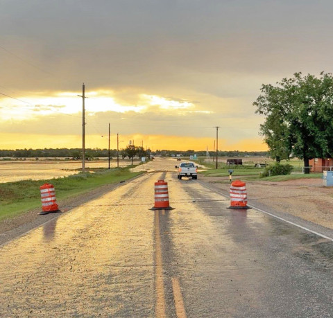 AREA ROADS FLOODED After days of rain by Monday morning, area roads coming into and out of Texas Spur Country were flooded, like this one in Rotan, where through travellers were forced to detour through Roby. This part of 611 was off limits for a while. | DOUBLE MOUNTAIN CHRONICLE